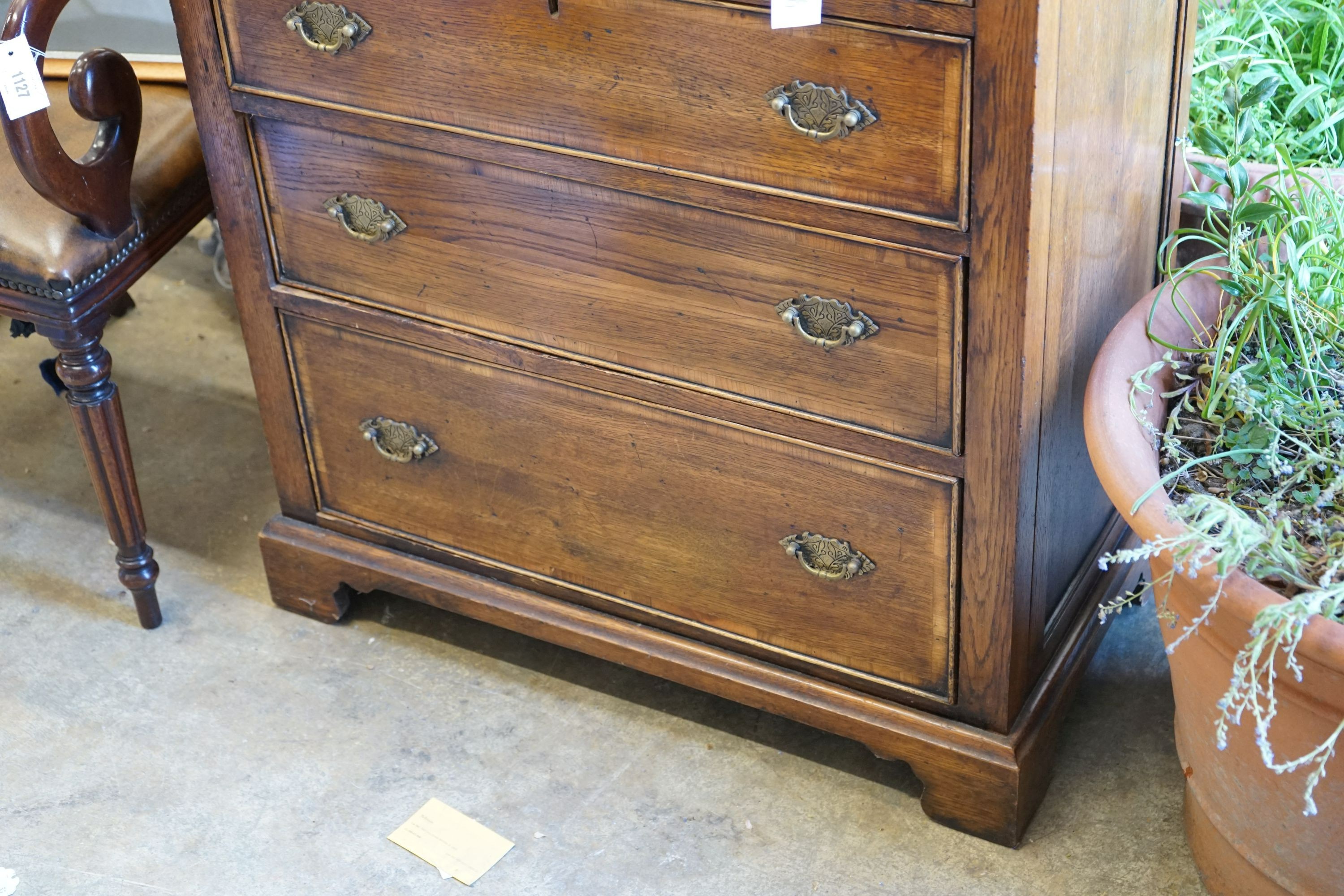 An 18th century style oak chest, width 83cm depth 46cm height 104cm